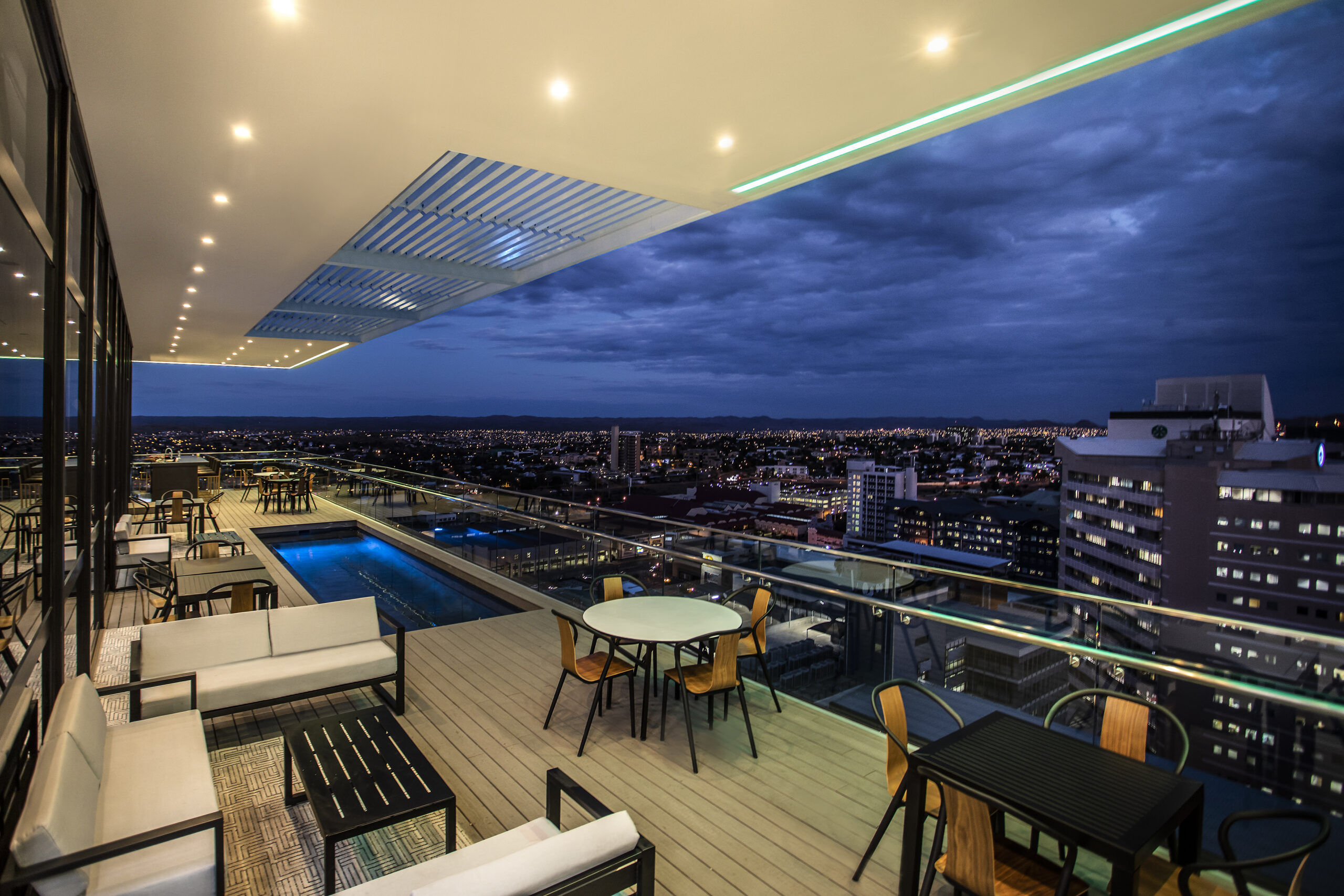 avani windhoek hotel and casino exterior view stratos rooftop at night